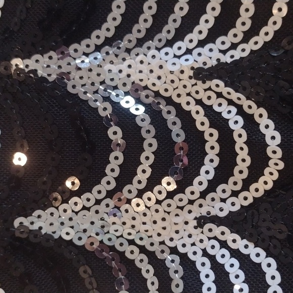 A black white and silver halter top with back zipper and cups, midrift - Picture 6 of 6